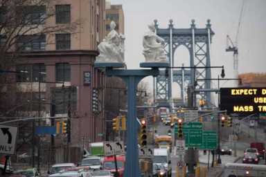 ‘Miss Brooklyn’ statue back in front of Manhattan Bridge — and now it lights up and spins!