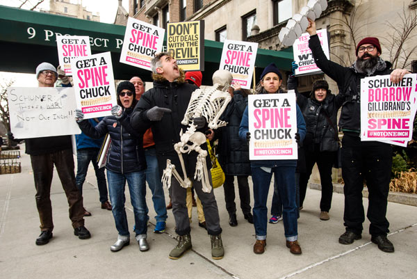 Protesters bring literal spines to Chuck Schumer’s house