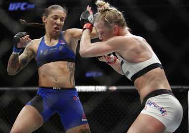 Shocks and surprises as new champ crowned at UFC 208