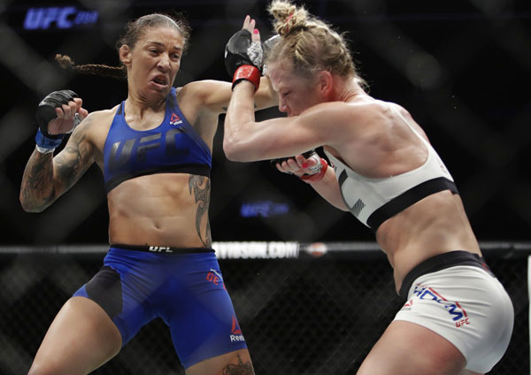 Shocks and surprises as new champ crowned at UFC 208
