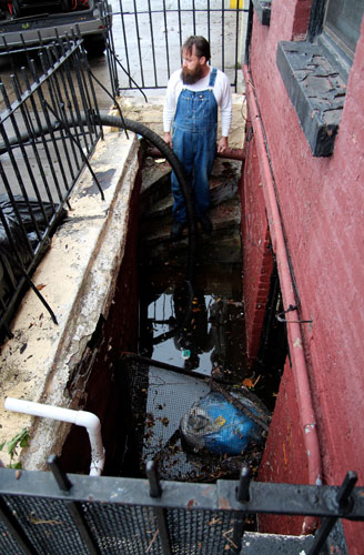 Bar owner’s narrow escape from flooded basement