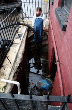 Bar owner’s narrow escape from flooded basement
