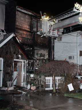 Flames erupt in Bergen Beach home