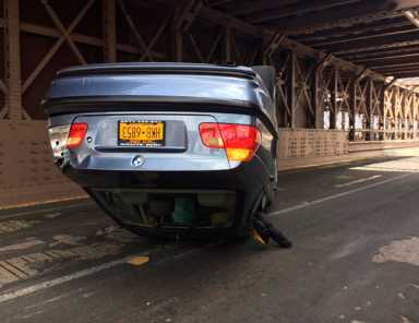 We drove by shortly after this car flipped on Brooklyn Bridge yesterday.