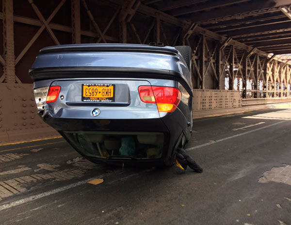 We drove by shortly after this car flipped on Brooklyn Bridge yesterday.