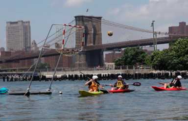 Float your boat: Kayak polo players make a row in Brooklyn Bridge Park