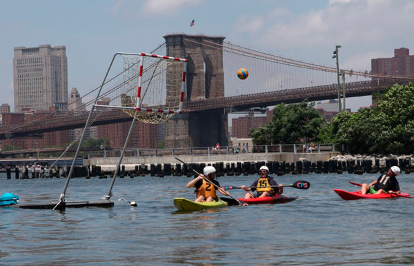 Float your boat: Kayak polo players make a row in Brooklyn Bridge Park