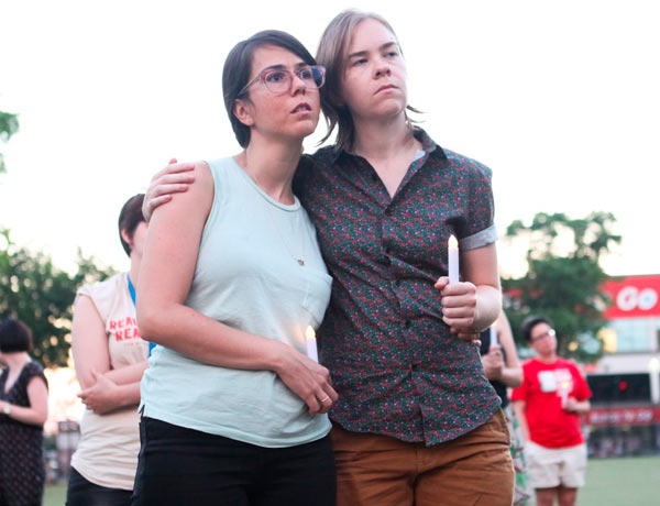 Somber send-off: Pride concludes with vigil for Pulse shooting victims
