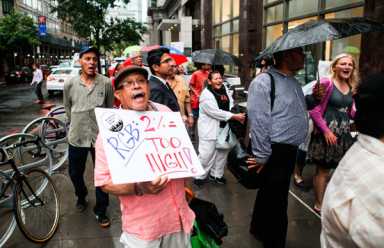 Affordable housing advocates storm Rent Guidelines Board amid downpour