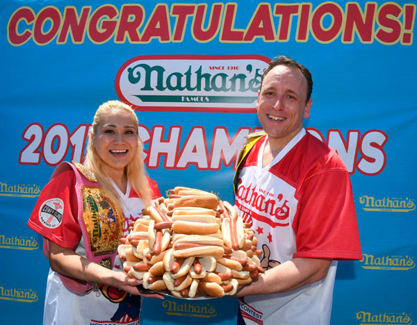Champ of the chomp Joey Chestnut breaks hot-dog-eating record with six dozen dogs