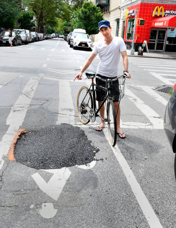Hole new problem: City doing poor job repairing Ridge sinkhole, say locals