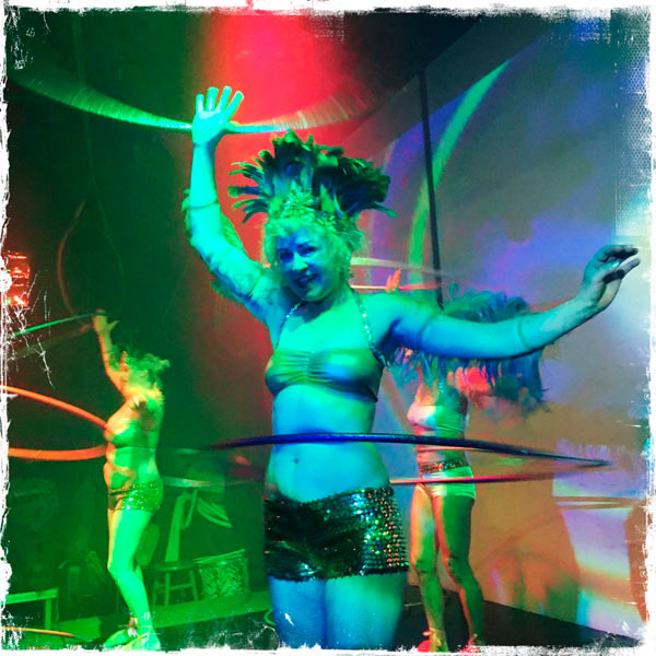 Hoop — there it is! Cosmic hula-hoopers perform in Dumbo