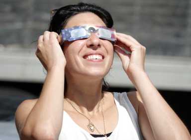 Staring at the sun: Brooklynites look up at library’s eclipse event