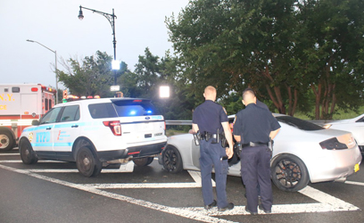 Woman rear-ends police car on Knapp Street