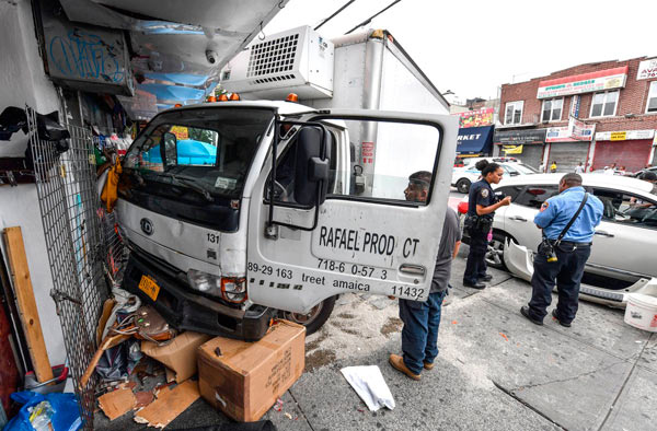 Box truck slams into Utica Avenue storefront