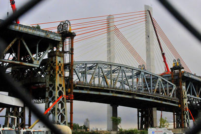 Demolition day: Center of old Kosciuszko span removed, sailed into sunset on barges