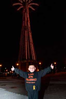 Going for the gold: Parachute Jump lights up for cancer awareness