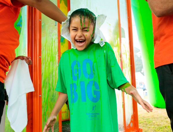 Goop, there it is! Kids get doused with Nickelodeon’s signature slime at P’Park fund-raiser