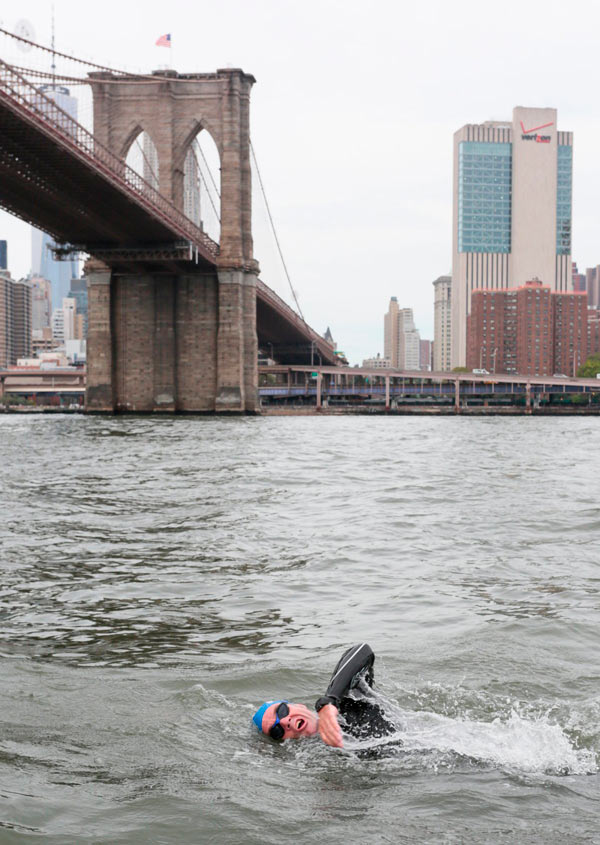 Daring to dip: Activist swims East River after taking on Gowanus Canal and Newtown Creek