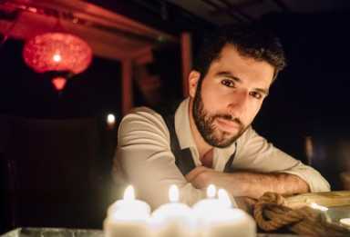 Ghost host: Mentalist leads a spooky seance for 13