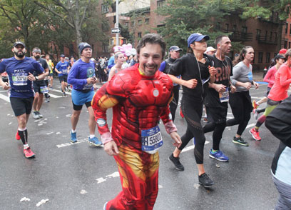 Miles of motivation: Cheering fans help runners complete longest leg of New York City Marathon in boro