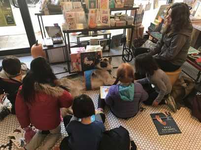 Cultured canines: Kids read pup lit to pack of pooches at Park Slope bookstore