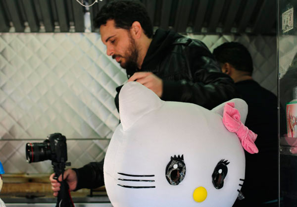 Kitty cornered: Doc looks at the people inside the Hello Kitty costumes