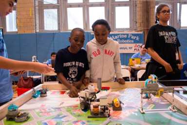 Kids have robots flush toilets, fix pipes at JHS 278 robotics tournament