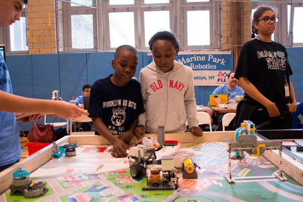 Kids have robots flush toilets, fix pipes at JHS 278 robotics tournament