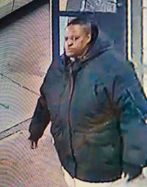 Police searching for man in connection with robbery of elderly woman