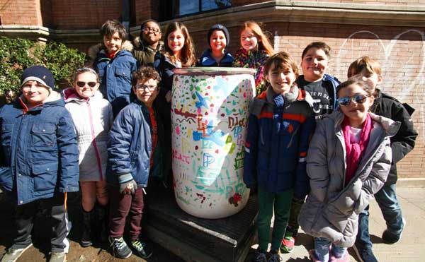Doing good by the gallon: Young environmentalists skip lunch to install water-conservation barrel at Slope school