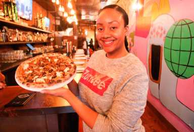 Slice and spice: Pizza spot adds Caribbean flavors to its pies