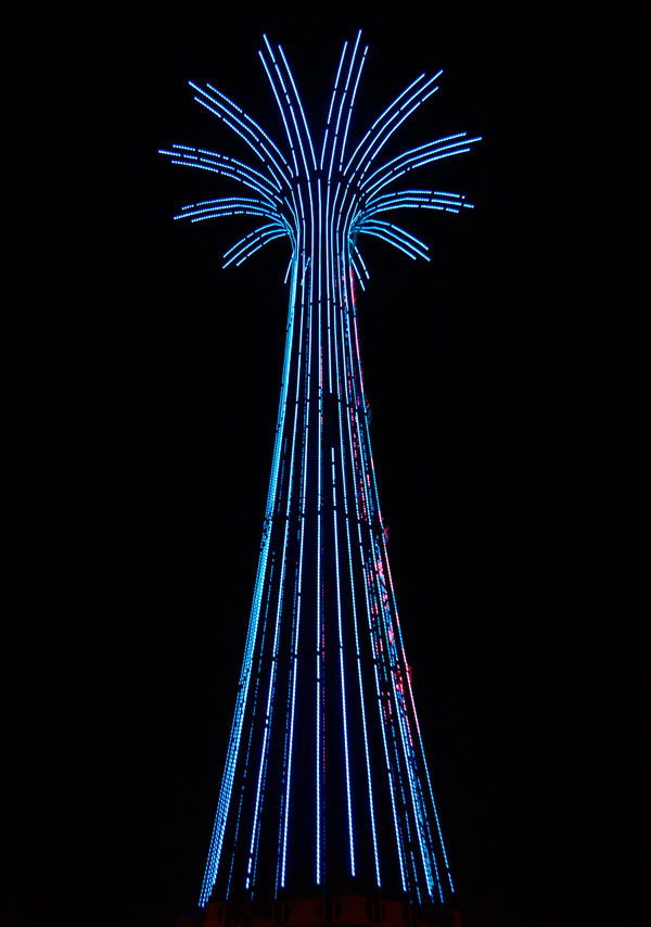 Coney Parachute Jump lit-up blue to highlight autism