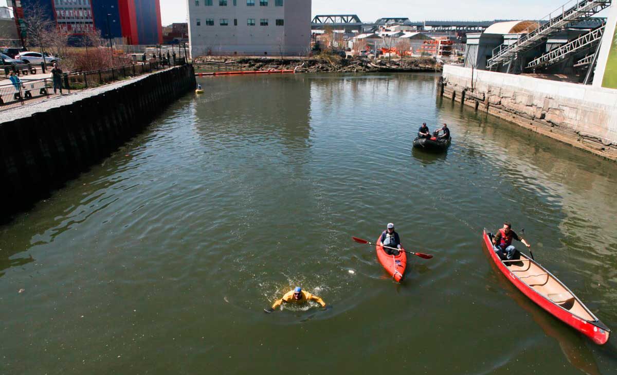 Mucky day: Daredevil activist returns to Gowanus Canal for Earth Day dip