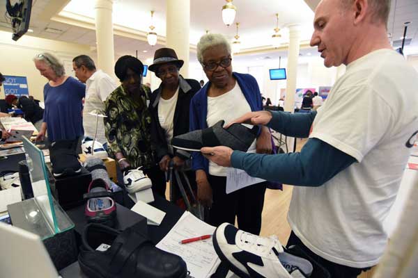Hip with the times! Techies update oldsters on latest gadgets and smart-living tips at fair