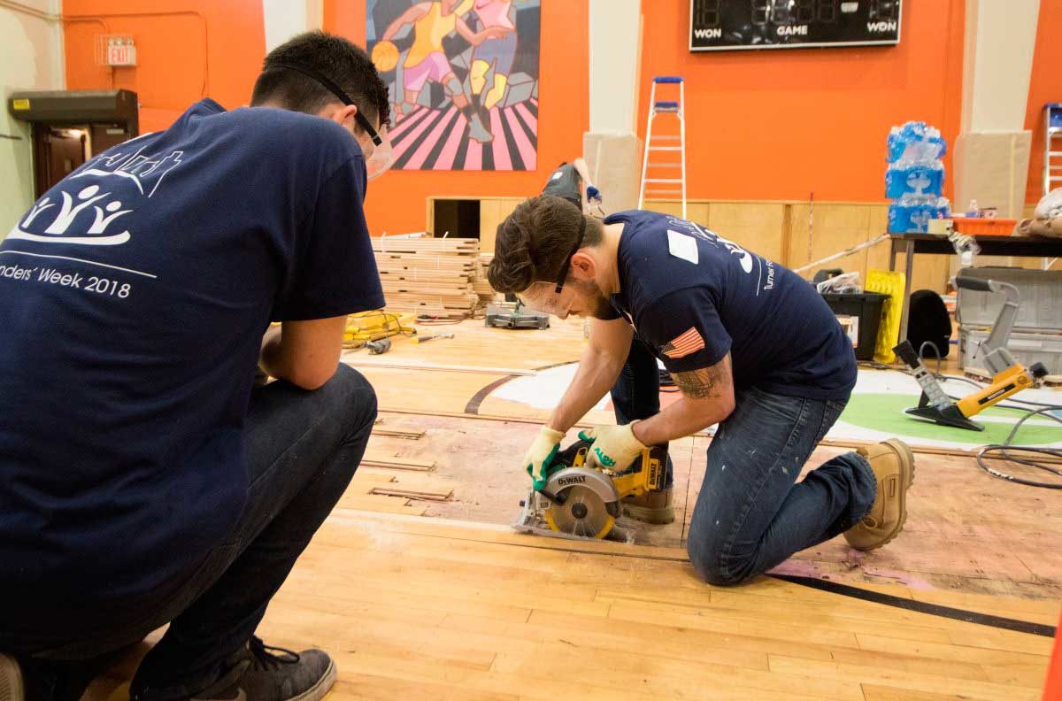 Order on the court: Volunteers spruce up hoops at V’Hill complex’s community center