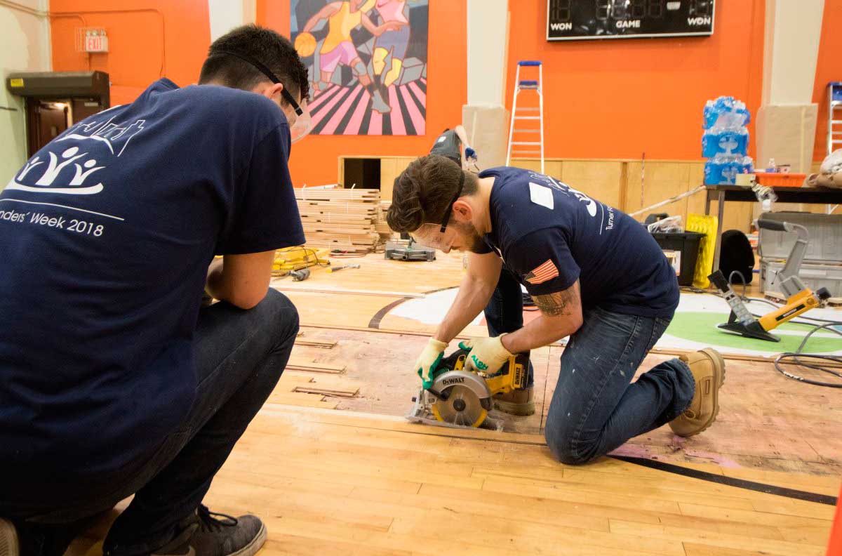 Order on the court: Volunteers spruce up hoops at V’Hill complex’s community center