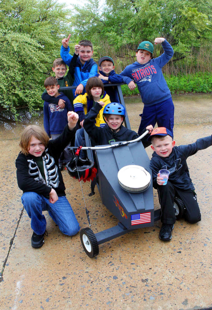 Tykes take the wheel: Kings County Cub Scouts compete at full throttle in go-kart race