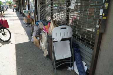 Chain in the a–! Kensington center’s staff exasperated with homeless man who locks his stuff to its gate