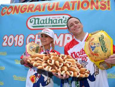 Top dog: Returning champ Chestnut downs 74 wieners at annual Coney contest