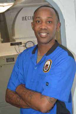 Brooklyn native serves his country — and crew — as a Navy culinary specialist