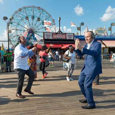 Stayin’ alive! Locals, pols groove at silent disco celebrating landmarking of Coney Island Boardwalk