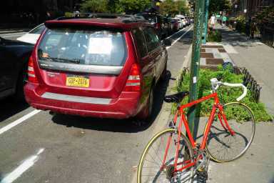 Locals: DOT botched Slope bike lane due to parked car it could have easily moved
