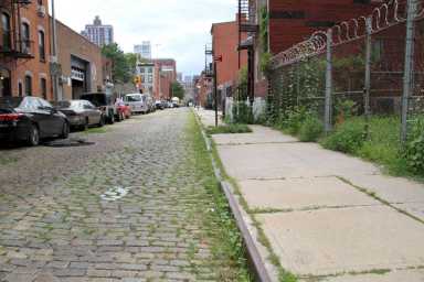 Between a block and a hard place: Plan to revamp Dumbo plaza and nearby Belgian-block streets draws mixed reactions
