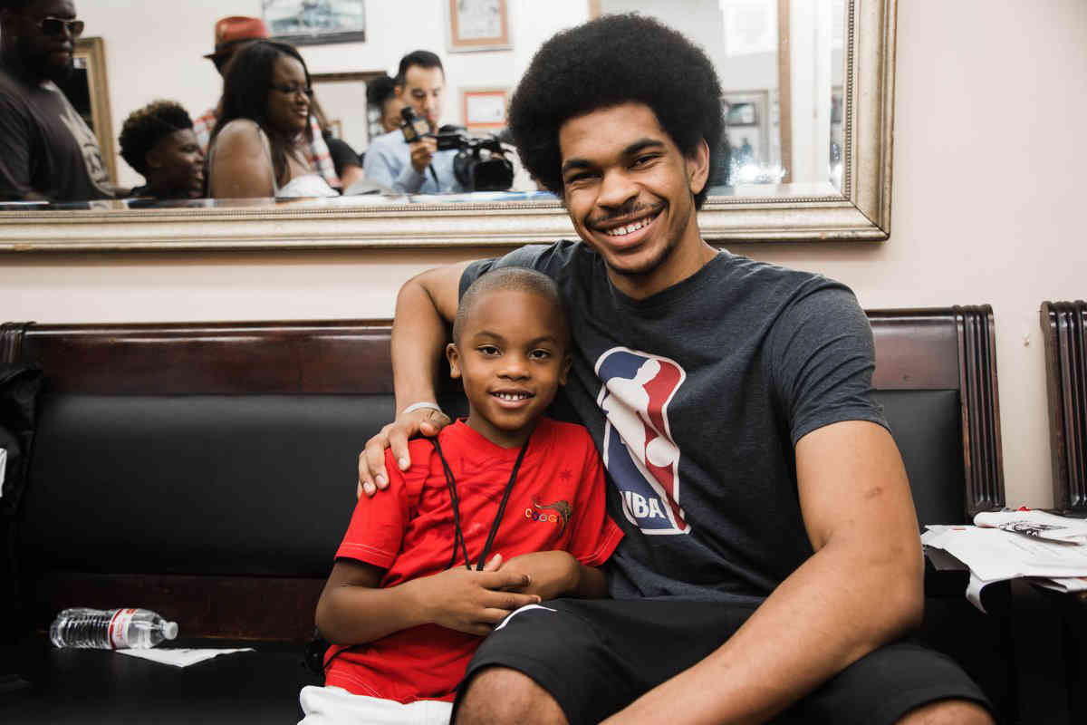 Good hair day: Nets star treats students to back-to-school cuts, supplies