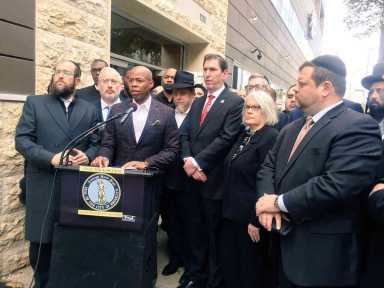 Showdown: Hizzoner butts head with beep over his call for armed off-duty cops in houses of worship