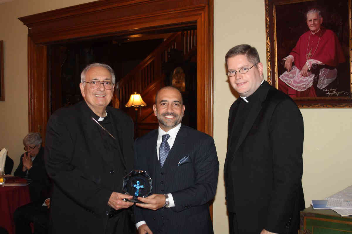 What a saint: Lawyer awarded by Catholic Migration Services