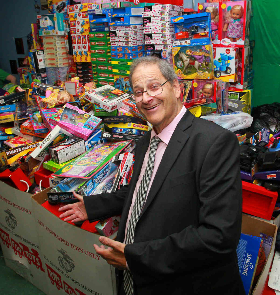 Holiday haul: Political club collects thousands of gifts for youngsters during annual toy drive