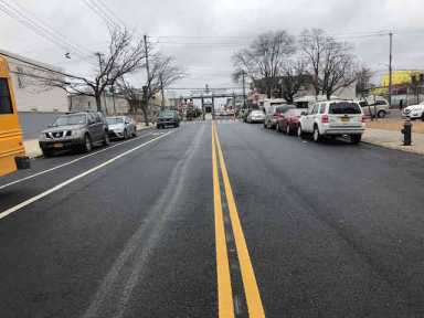City replaces, but doesn’t erase, squiggly yellow lines dividing stretch of Neptune Ave.