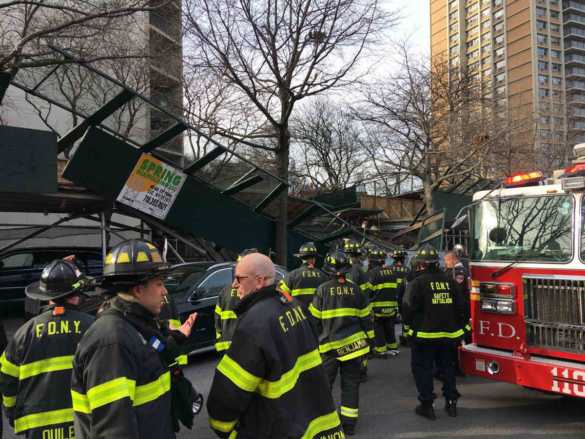 Scaffolding plummets onto Downtown street after driver smashes into structure